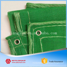 green construction safety net with rope and eyelets